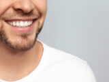 smiling man, free from teeth grinding